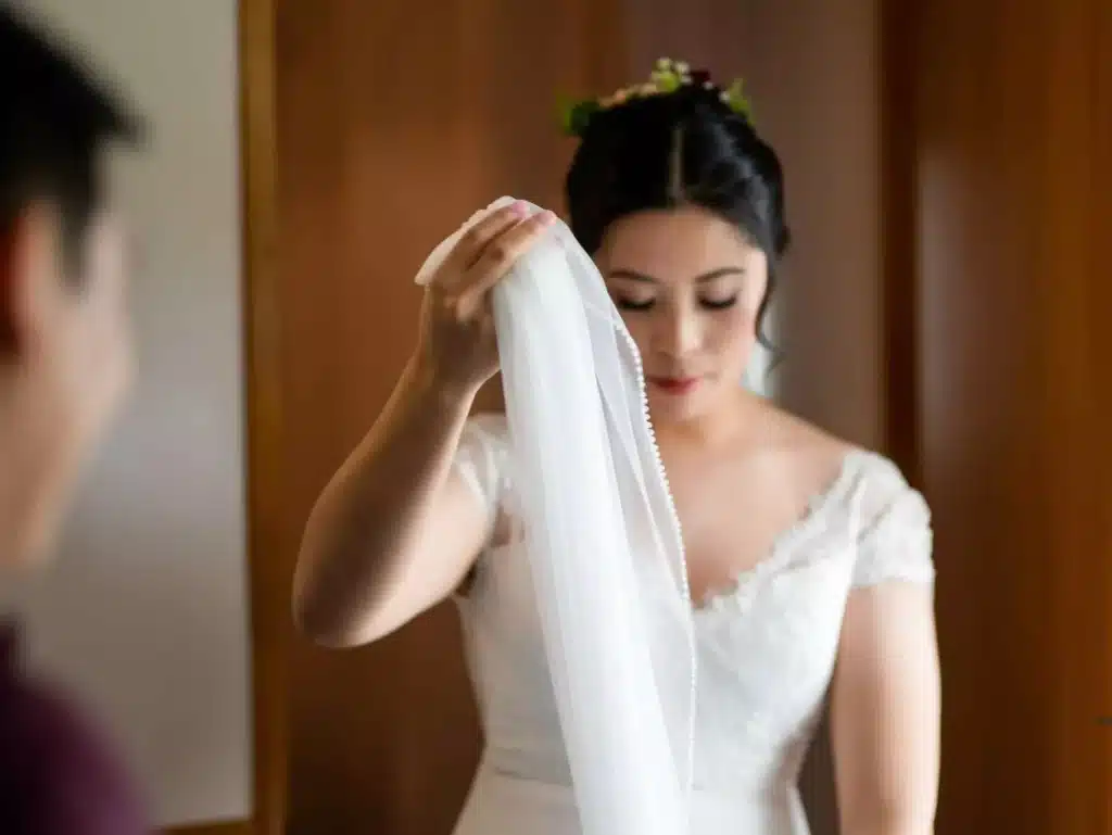 Bride preparing for her wedding photography session, captured beautifully by A Wedding Story, wedding photographers based in Wellington.