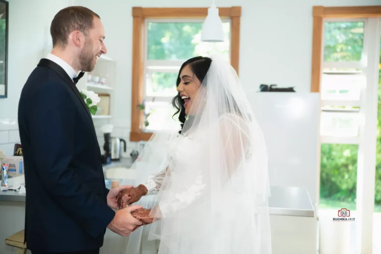 Naz and Michael's emotional first look captured by A Wedding Story, your trusted Wellington wedding photographer.