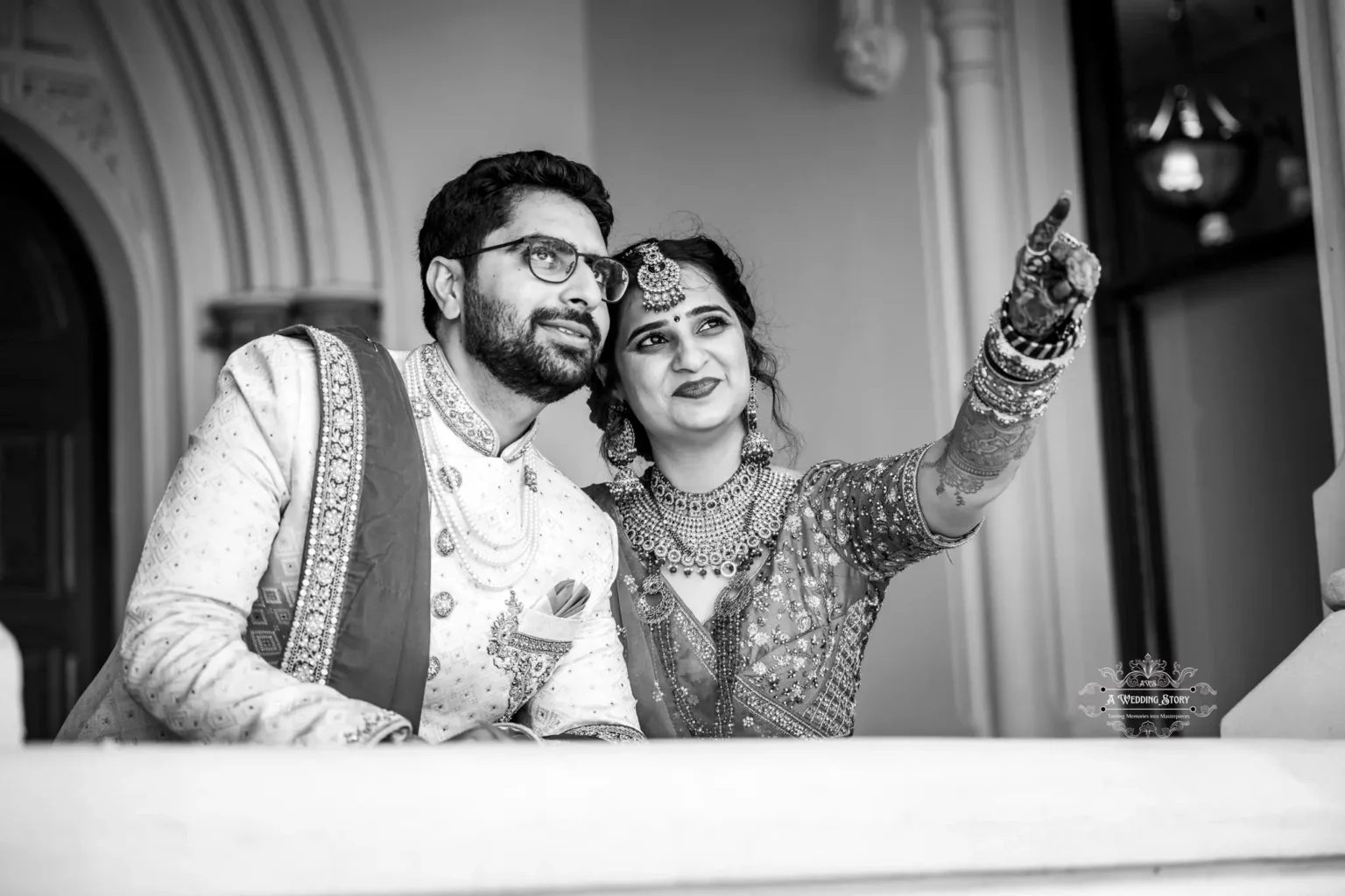 Black and white photo of a bride and groom sharing a joyful moment on their wedding day in Wellington, New Zealand.