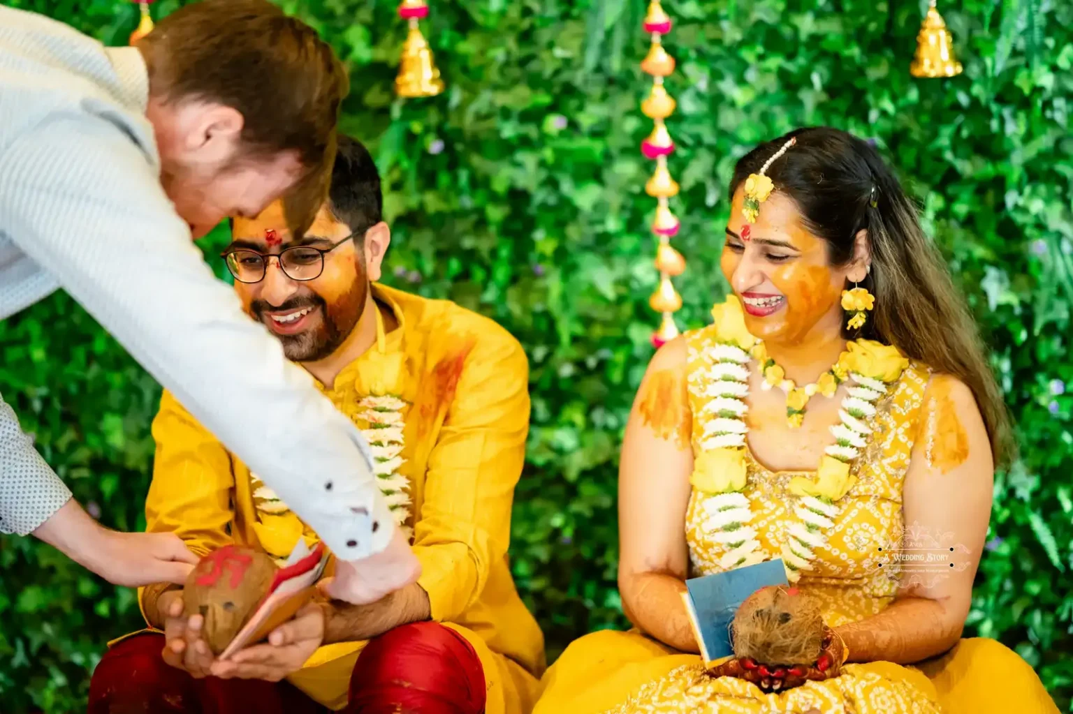 Bride and groom laughing during Haldi ceremony, captured by Wedding Photography in Wellington, New Zealand