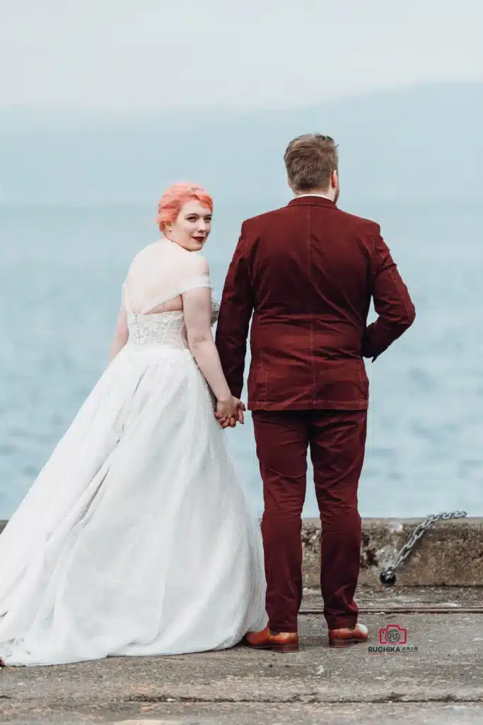 Post wedding portraits at Wellington Waterfront, located behind the Parliament House