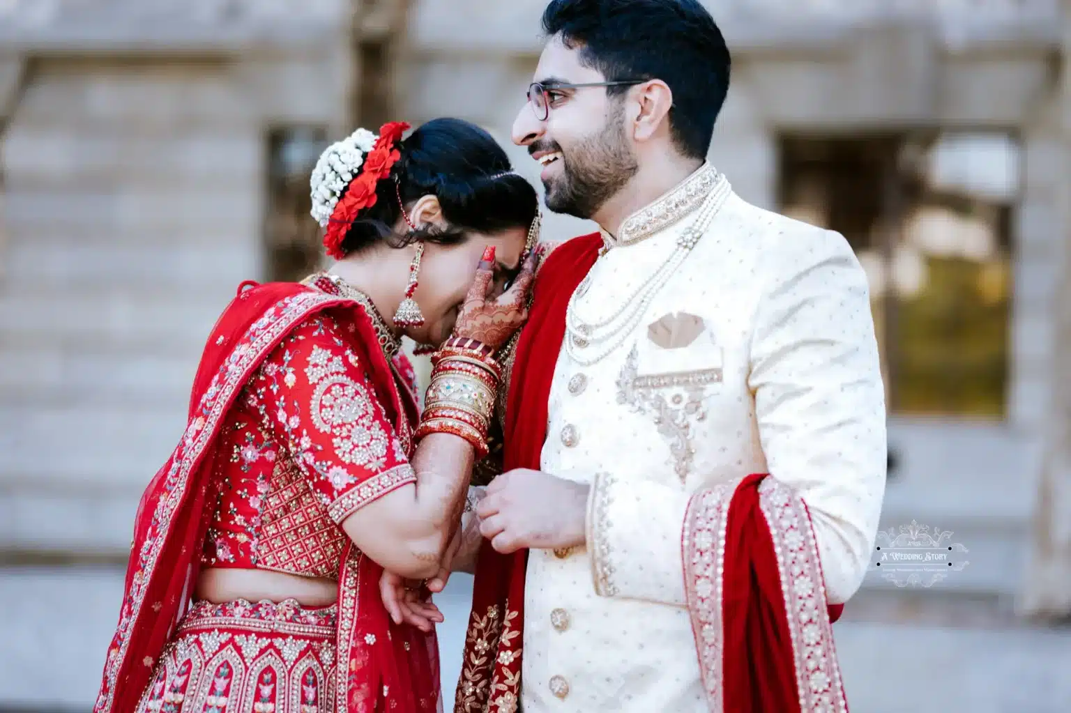 Bride covering her face in an emotional moment with the groom, captured during their wedding in Wellington, New Zealand.