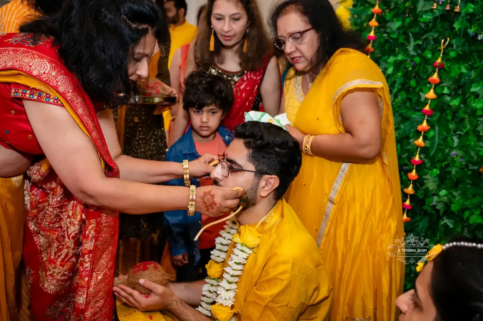 Groom receiving blessings from family during Haldi ceremony, captured by Wedding Photography in Wellington, New Zealand