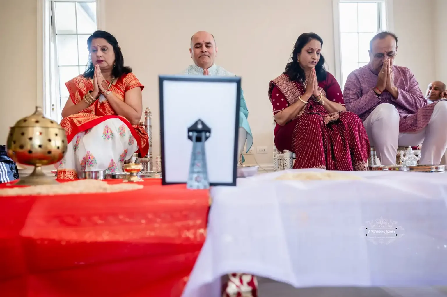 Family prayer ceremony during a wedding in Wellington, captured by Wedding Photography - A Wedding Story