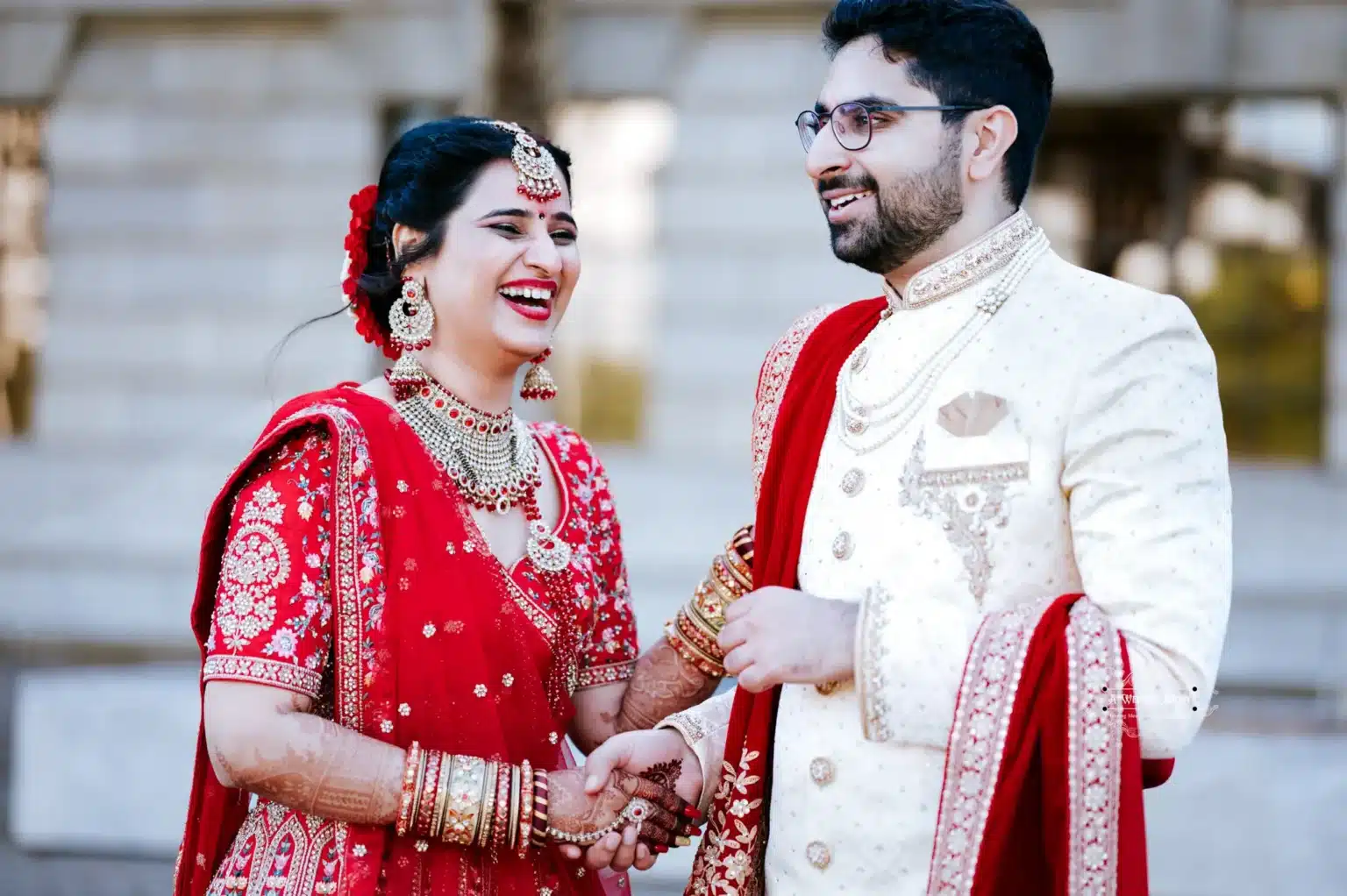 Bride and groom sharing a joyful moment, laughing together during their wedding in Wellington, New Zealand.