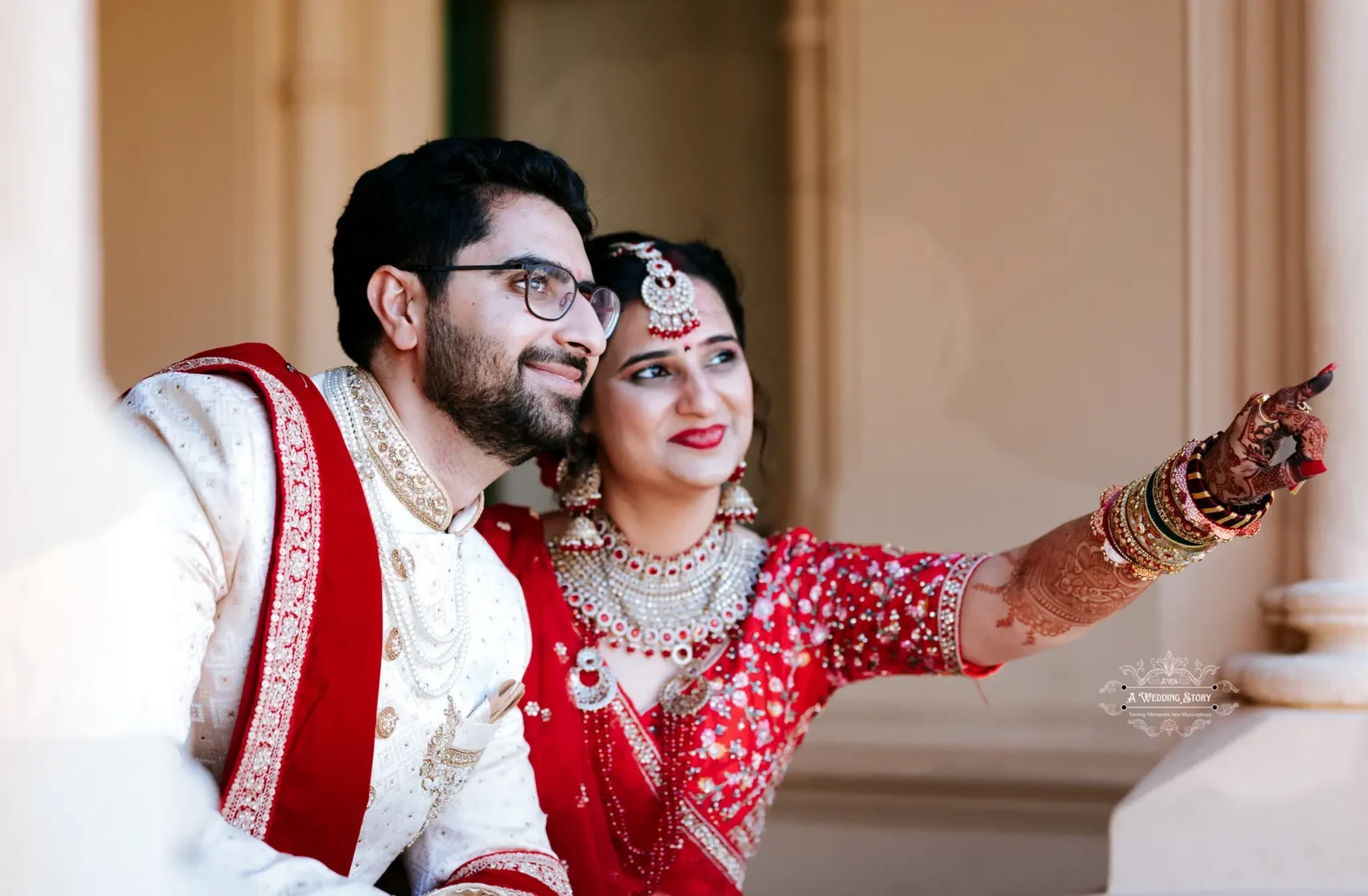 Smiling bride and groom in traditional attire during their wedding, captured by A Wedding Story in Wellington, New Zealand.