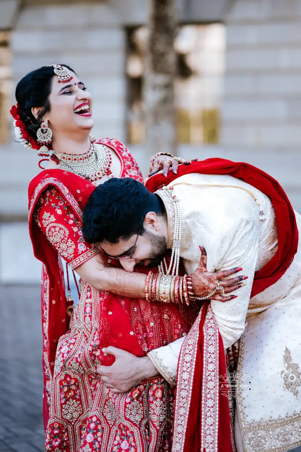 Bride and groom sharing a playful, joyful moment during their wedding in Wellington, New Zealand.