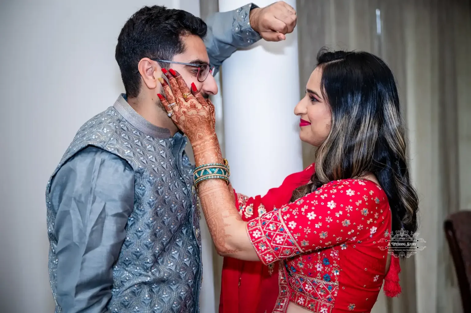 Bride lovingly touches groom's face during a pre-wedding ceremony in Wellington.