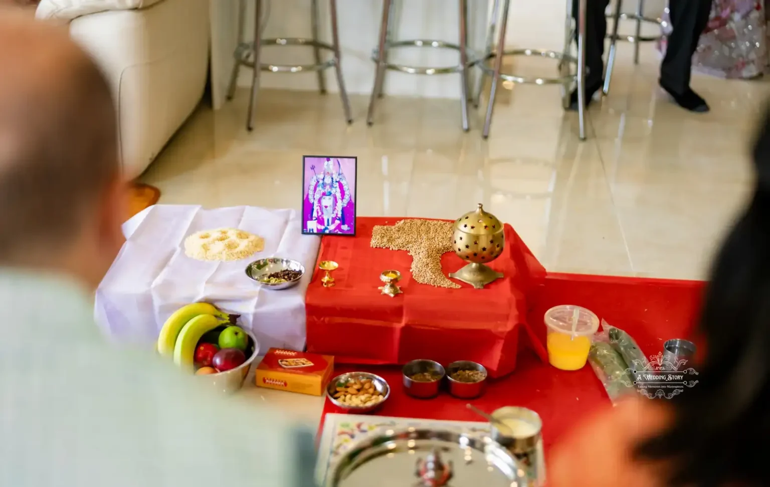 Traditional puja setup with offerings and religious items, captured by Wedding Photography in Wellington