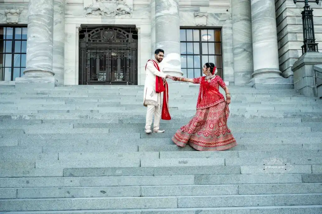 Samir and Moni in a stunning wedding shoot at the Parliament steps in Wellington.