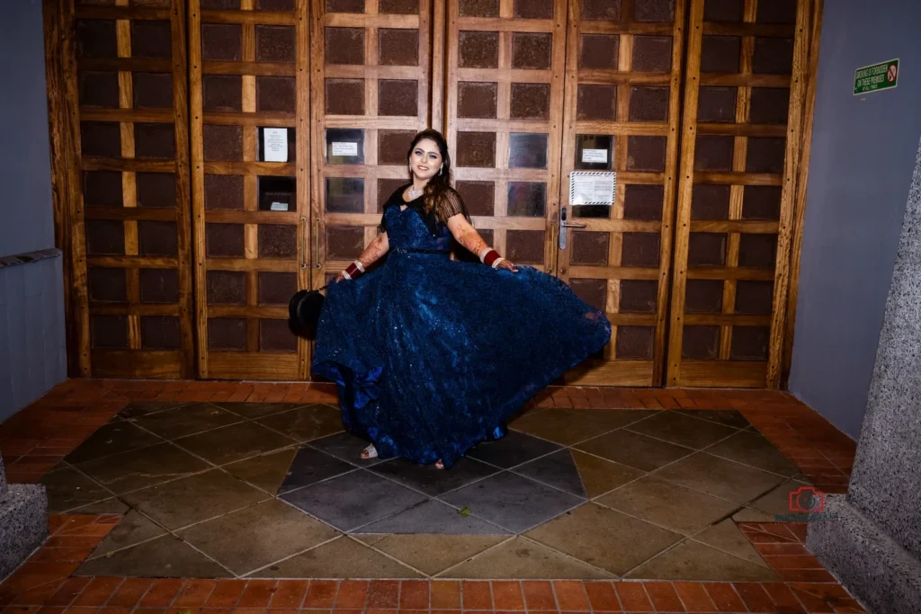 Woman Twirling in a Dark Blue