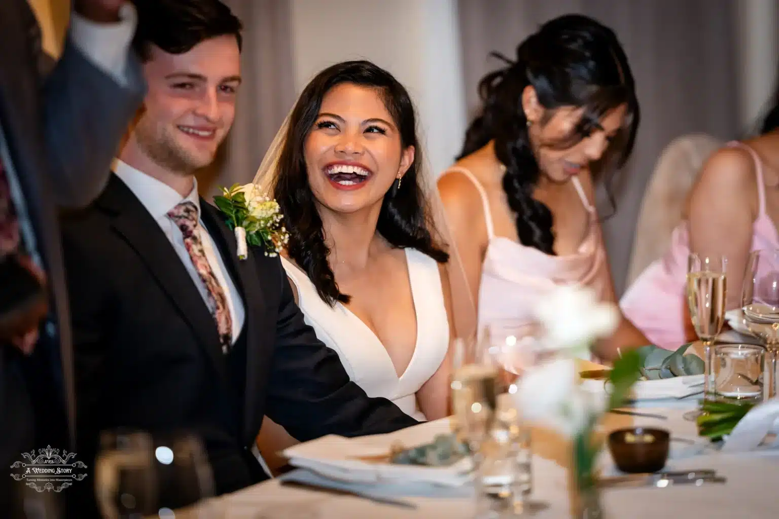 Bride and groom laughing during wedding reception in Wellington.