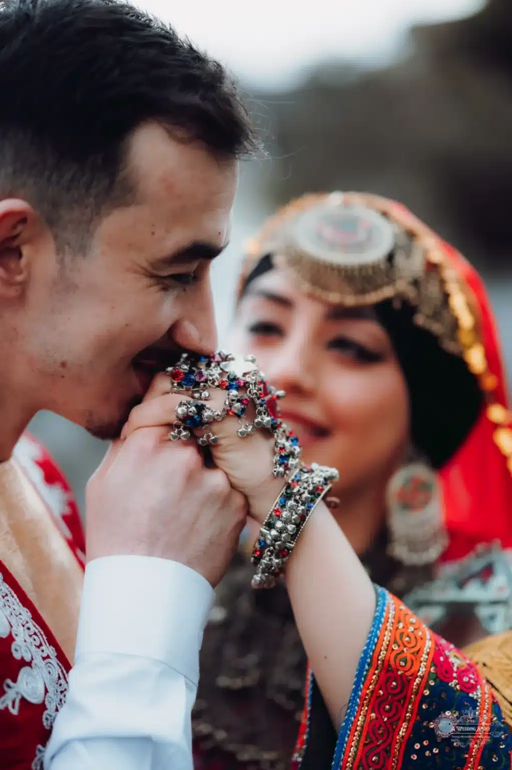 The bride and groom wore stunning traditional Afghan outfits at Lady Norwood Rose Garden