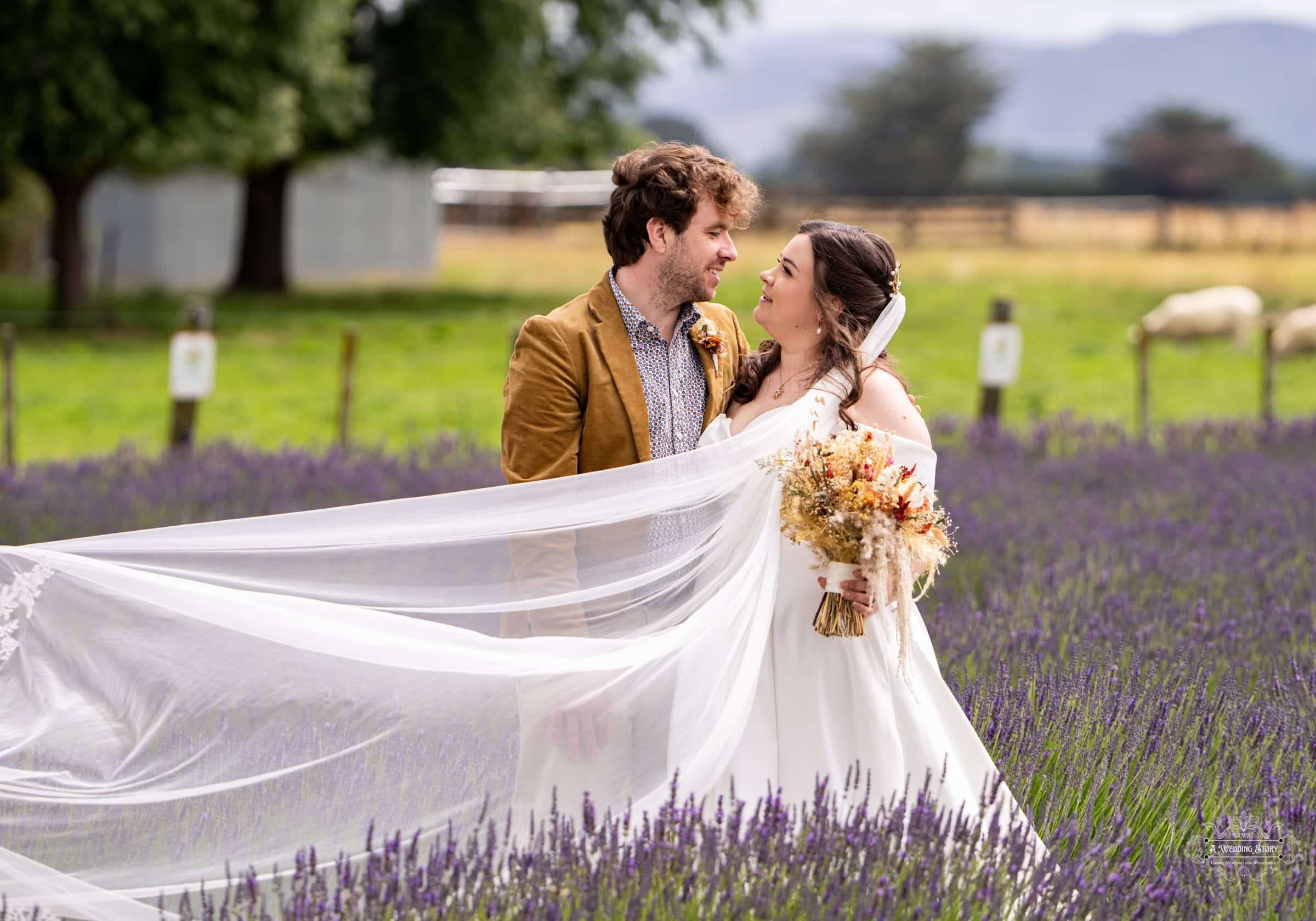 Bride and groom in a romantic wedding photoshoot at Lavender Abbey, Carterton, surrounded by scenic lavender fields