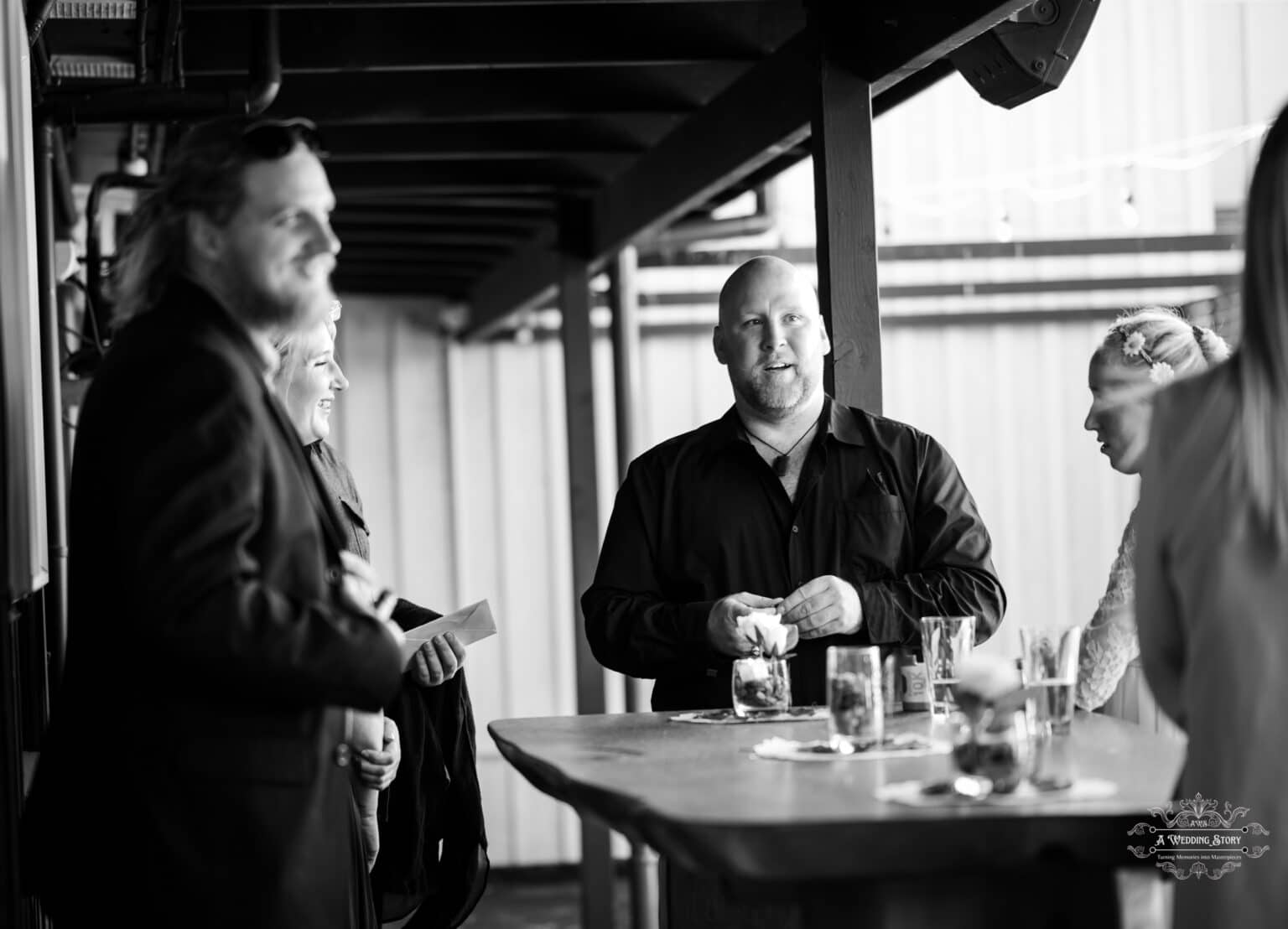 Guests enjoying casual conversations and drinks during the wedding reception at The Lodge Pāuatahanui Wellington